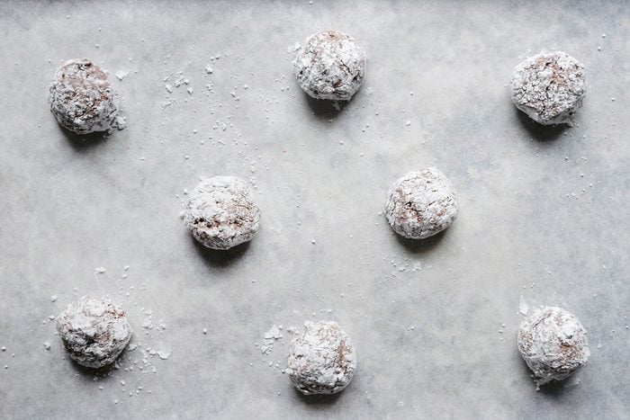 Placing the cookie drops in a cooking tray