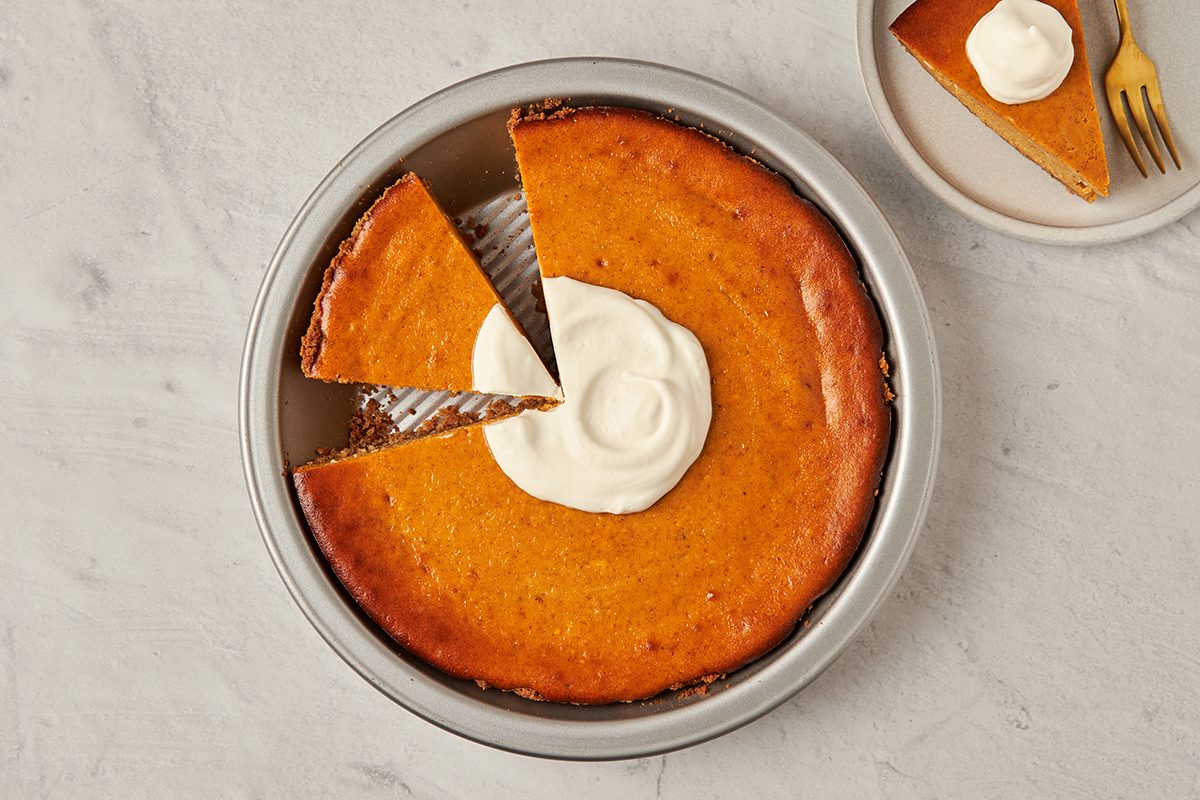A buttery pecan shortbread crust and velvety spiced filling come together in this cream cheese pumpkin pie recipe by Taste of Home.