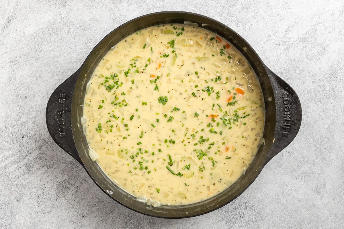 Taste of Home Cream of Onion Soup photo of the cooked soup topped with fresh chives.