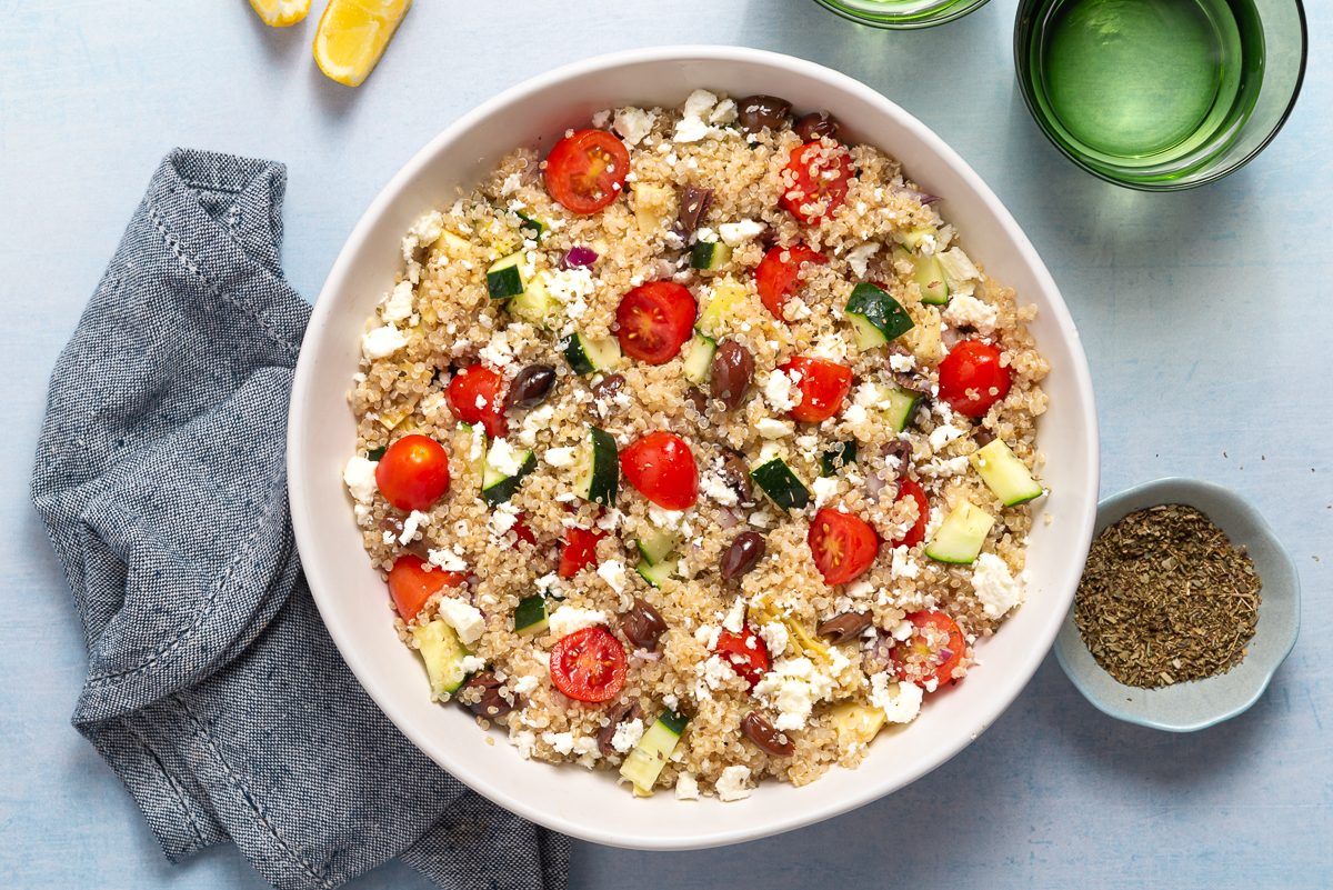 Greek Quinoa Salad Inside Bowl With Lemon And Oregano