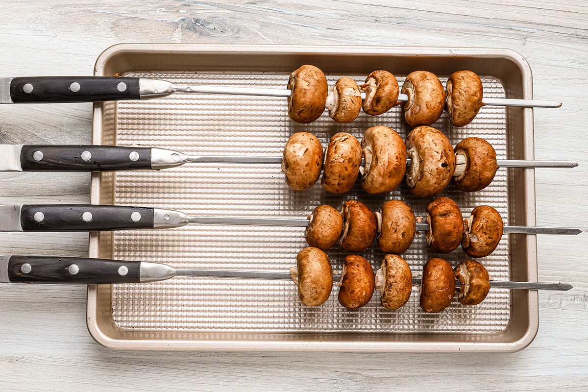 Mushrooms on skewers for grilling, a recipe from Taste of Home.