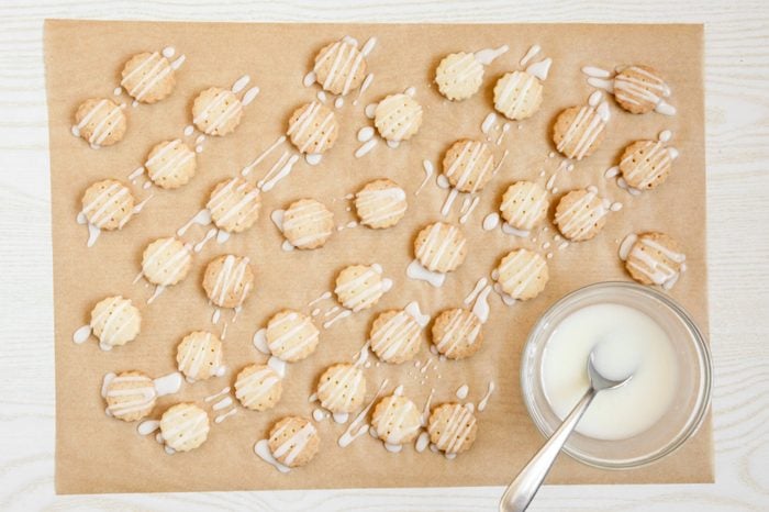 Drizzling Lemon Shortbread Cookies with icing