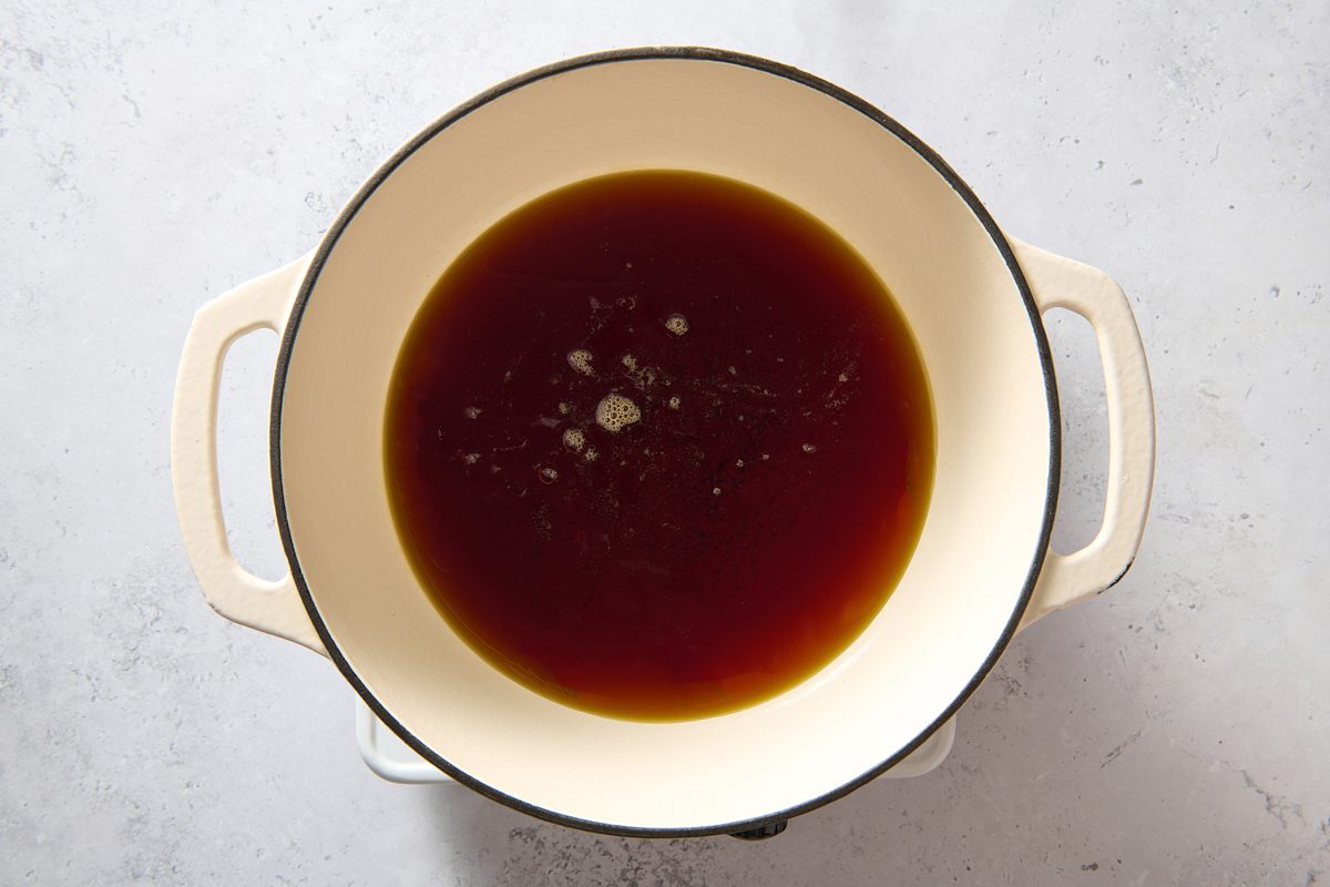 Maple syrup heating in a Dutch oven