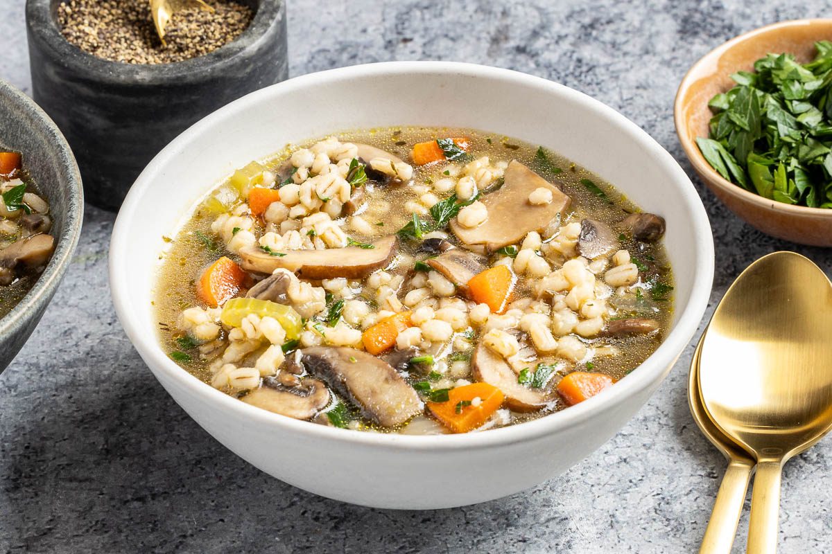 Taste of Home Mushroom Barley Soup recipe photo of the finished recipe served in bowls.