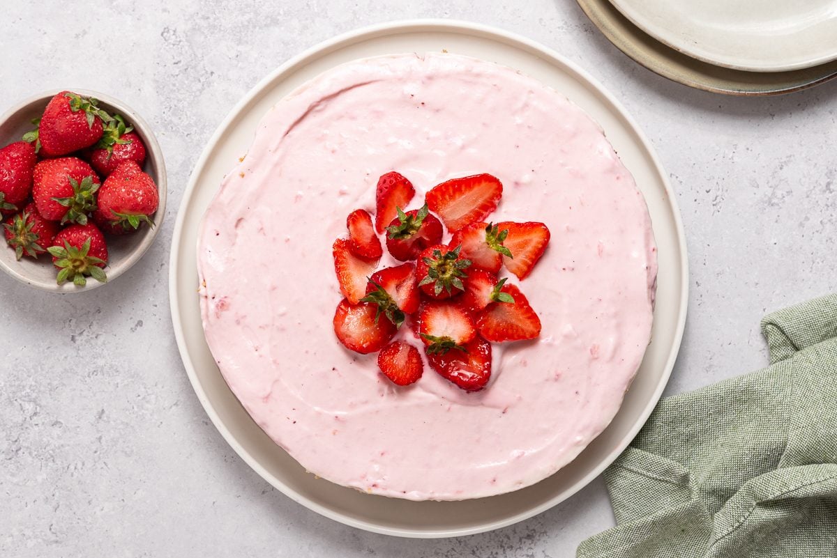 No Bake Strawberry Cheesecake On Serving Plate