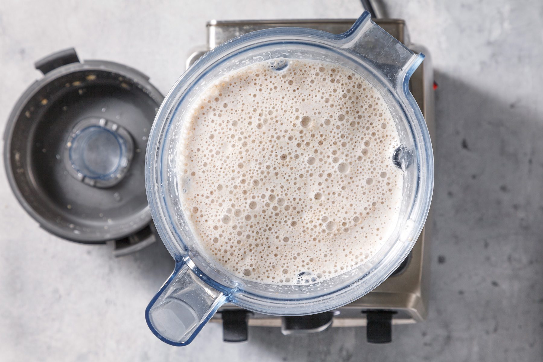 A blended mixture of oats, water, maple syrup, and salt