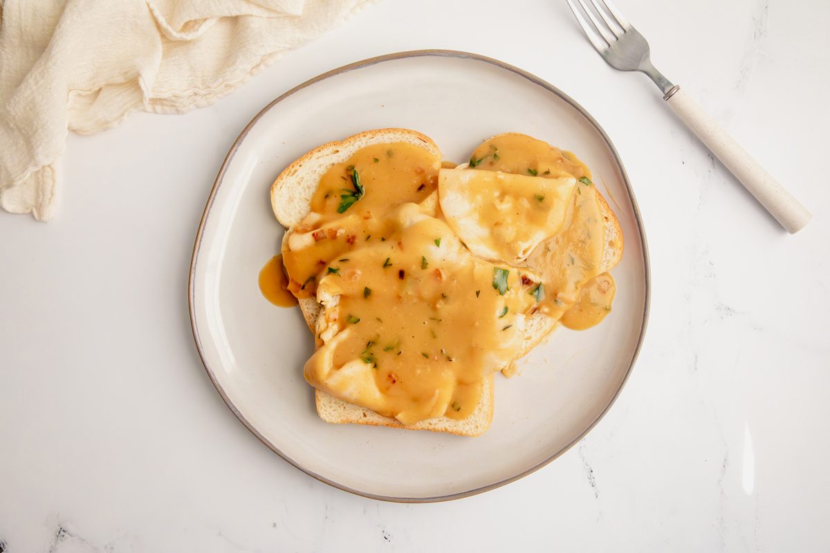 Overhead beauty shot for Taste of Home Open Faced Turkey Sandwich being served on a plate.