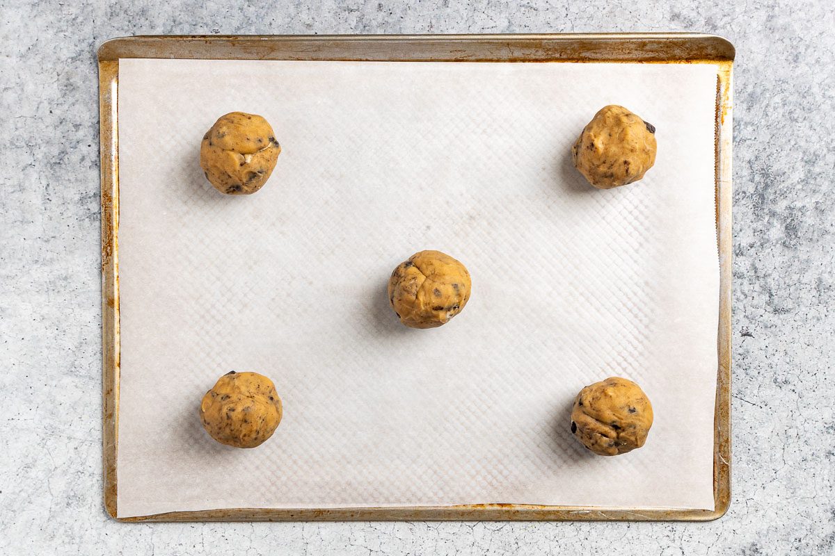 Taste of Home Oreo Cheesecake Cookies photo of the dough balls on a baking sheet.