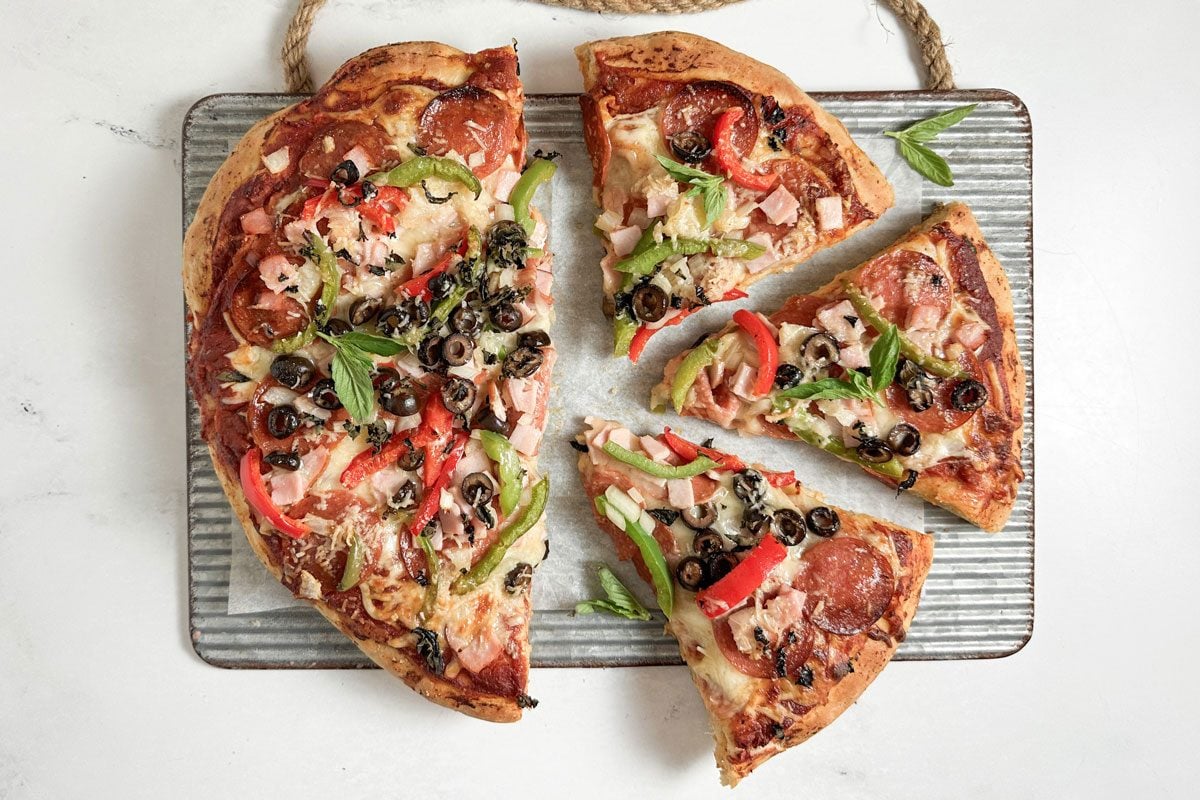 Taste of Home Pizza Supreme on a ribbed metal tray