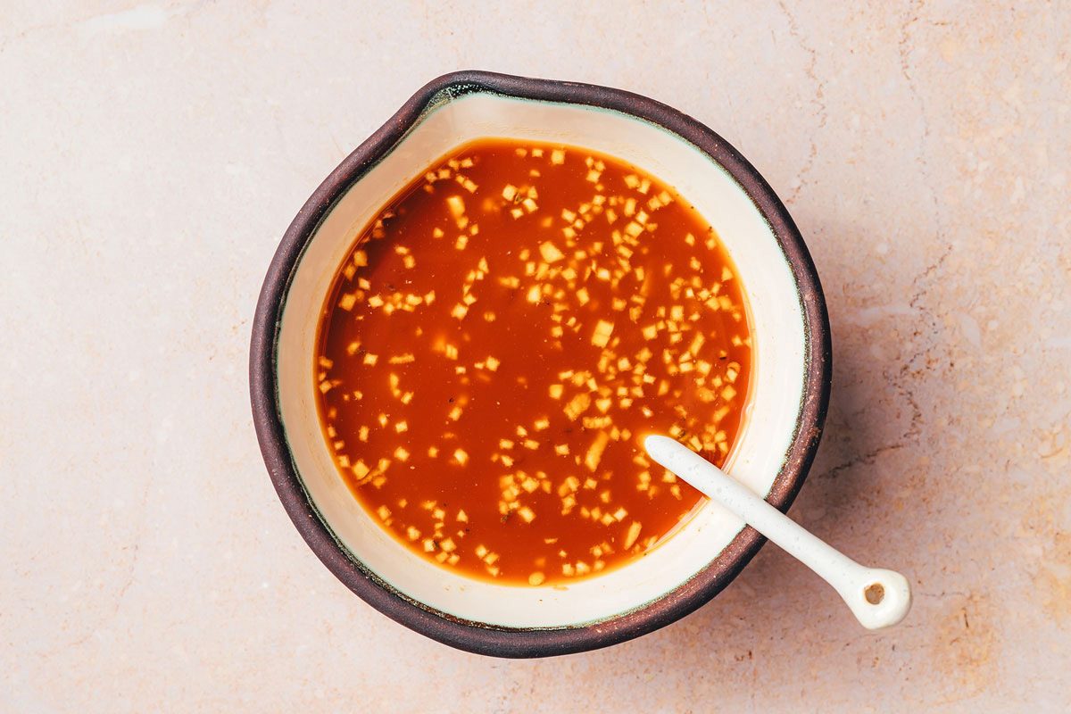 Gravy ingredients being mixed in a small bowl for the Pok Tenderloin and Gravy recipe by Taste of Home