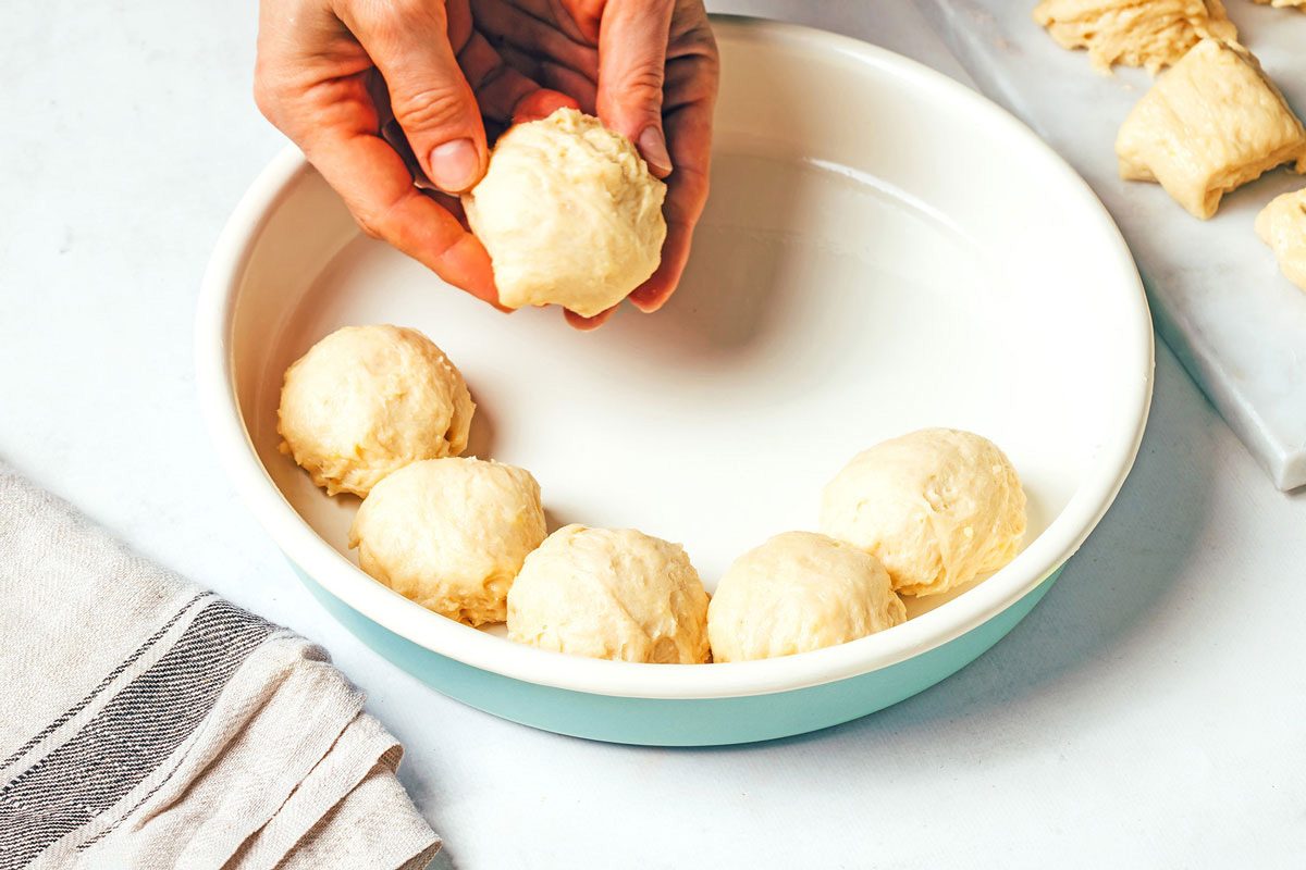 Dividing the dough into rolls before baking the Potato Rolls recipe for Taste of Home