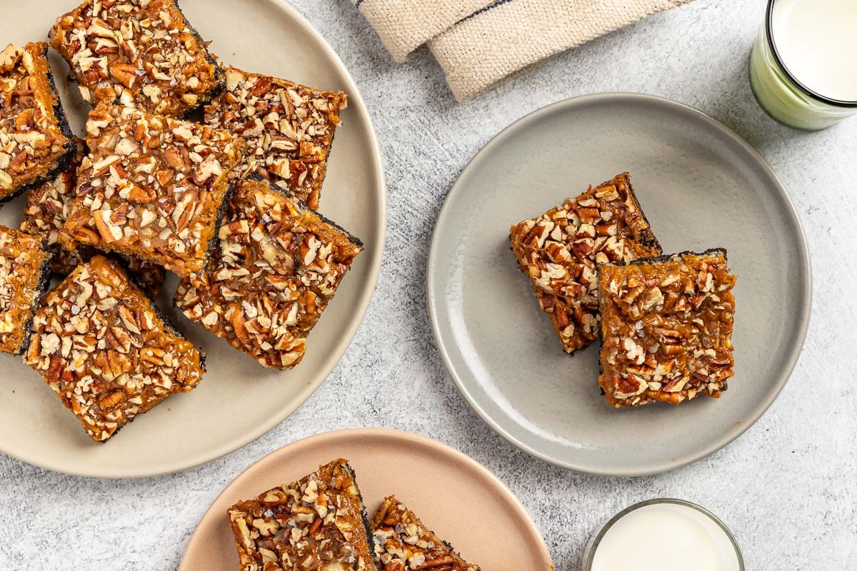 Seven-Layer Cookies cut into squares and set on plates.