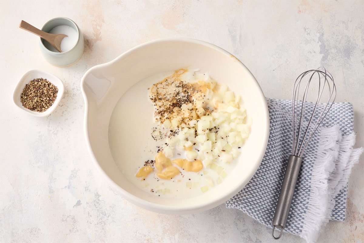 In A Large Bowl, Whisk Together Soup, Sour Cream And Milk.