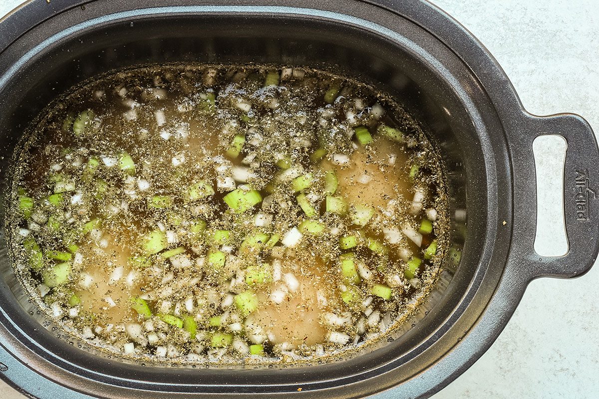Slow cooker preparation of chicken gnocchi soup.