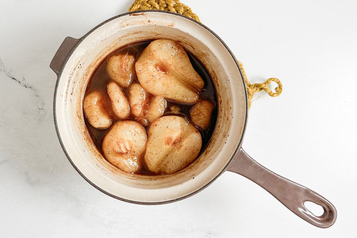 Taste of Home Spiced Pears in a ceramic saucepan