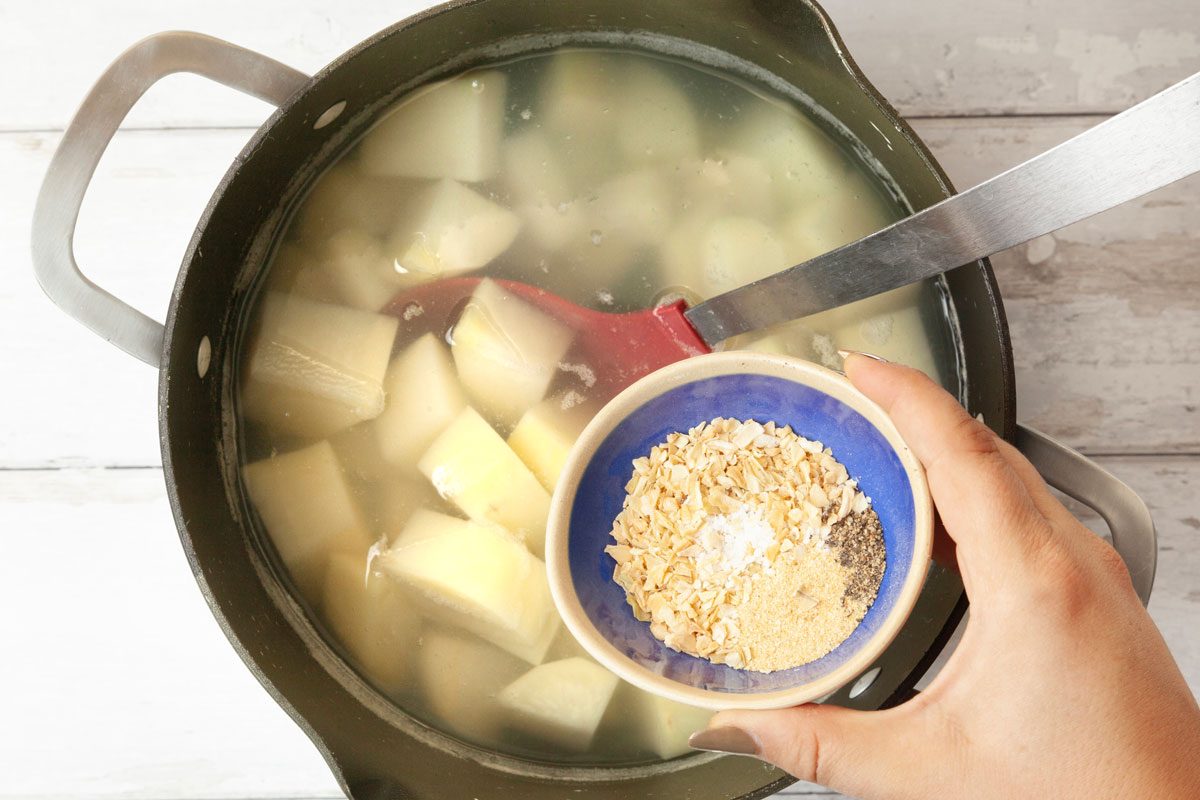 Step 2 of Taste of Home Stewed Potatoes is to Add the onion flakes, salt, pepper and garlic powder. Simmer for 30 to 35 minutes until the potatoes are tender and the liquid has reduced by half. Remove the pot from the heat and stir in the butter, slightly mashing some of the potatoes until reaching the desired consistency. Serve with a slotted spoon.
