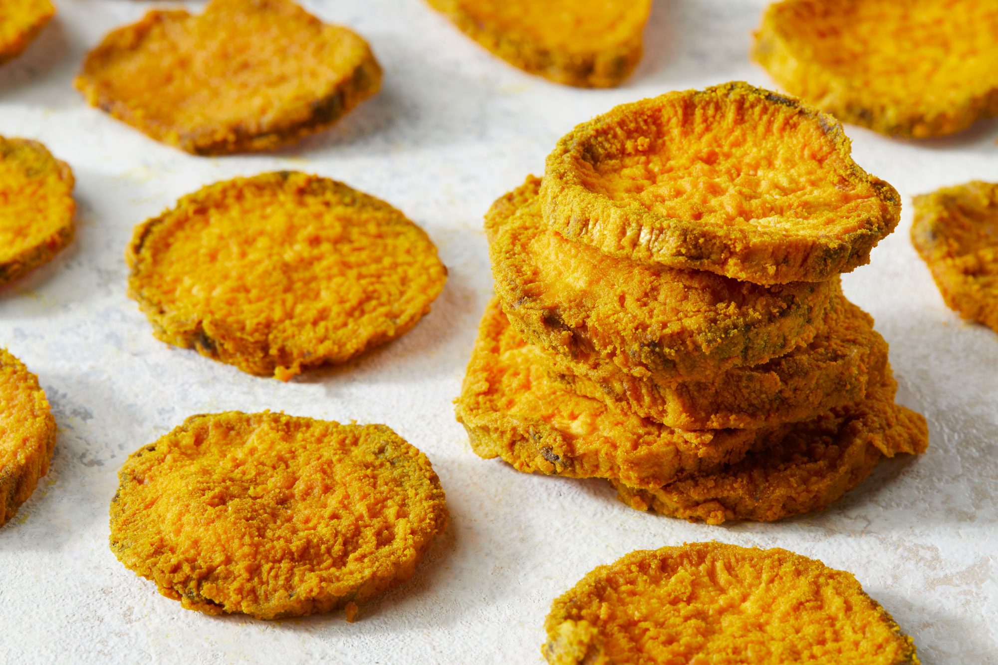 Sweet Potato Dog Treats stacked on each other