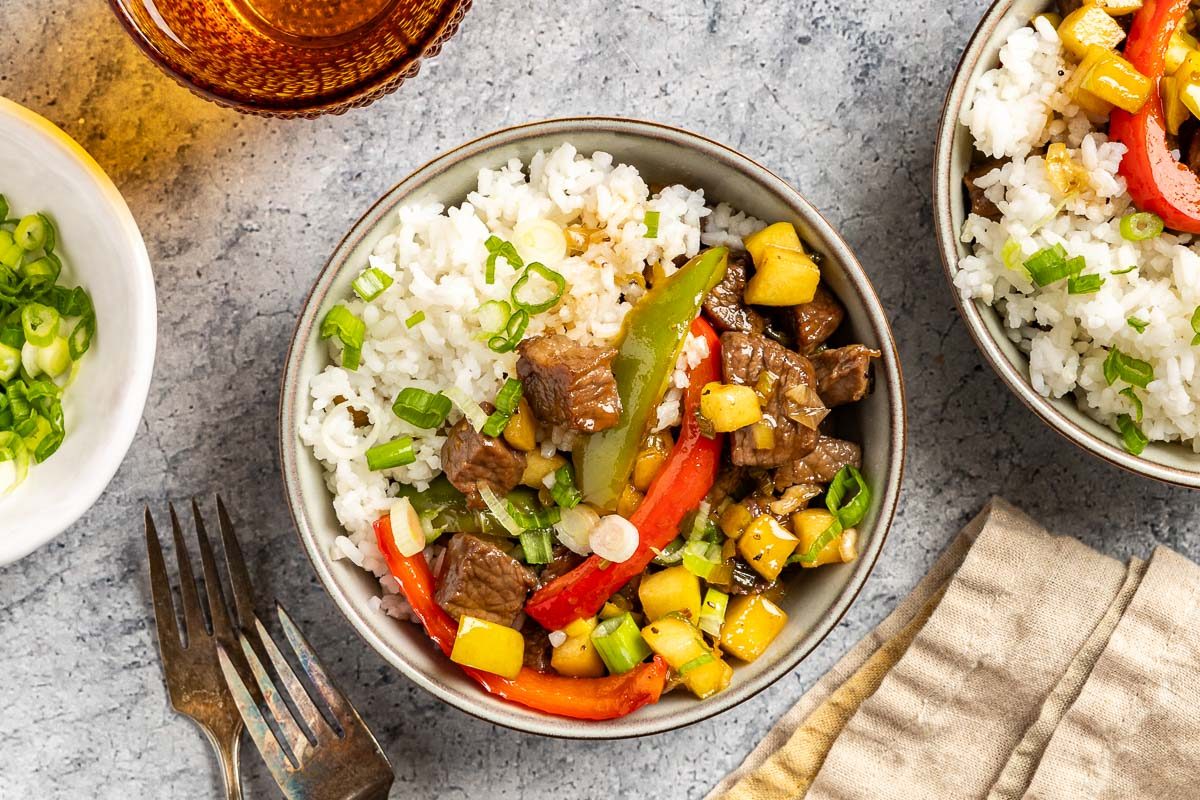 Taste of Home Sweet and Sour Beef photo of the finished recipe served with rice.