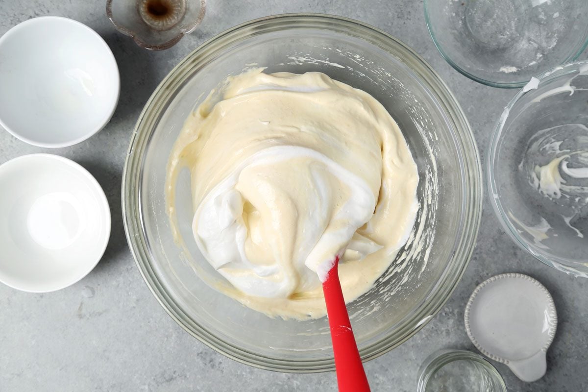 Process of making Taste of Home's Lady Fingers on a baking sheet on a wire rack.