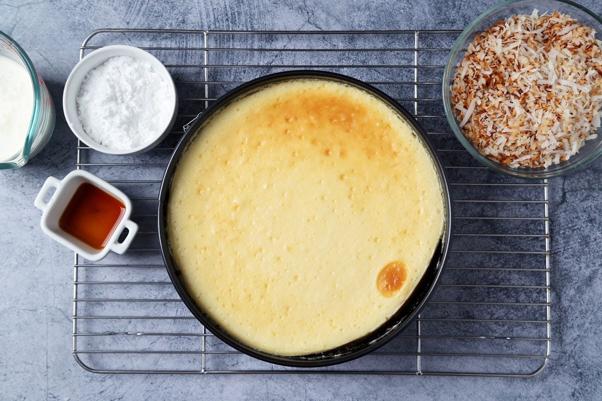 Process of making Taste of Home's Coconut Cheesecake on a dark blue surface.