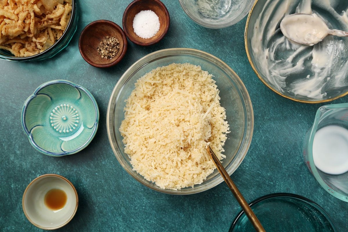 Process of making Taste of Home's Gluten Free Green Bean Casserole in a white casserole dish on a teal surface.