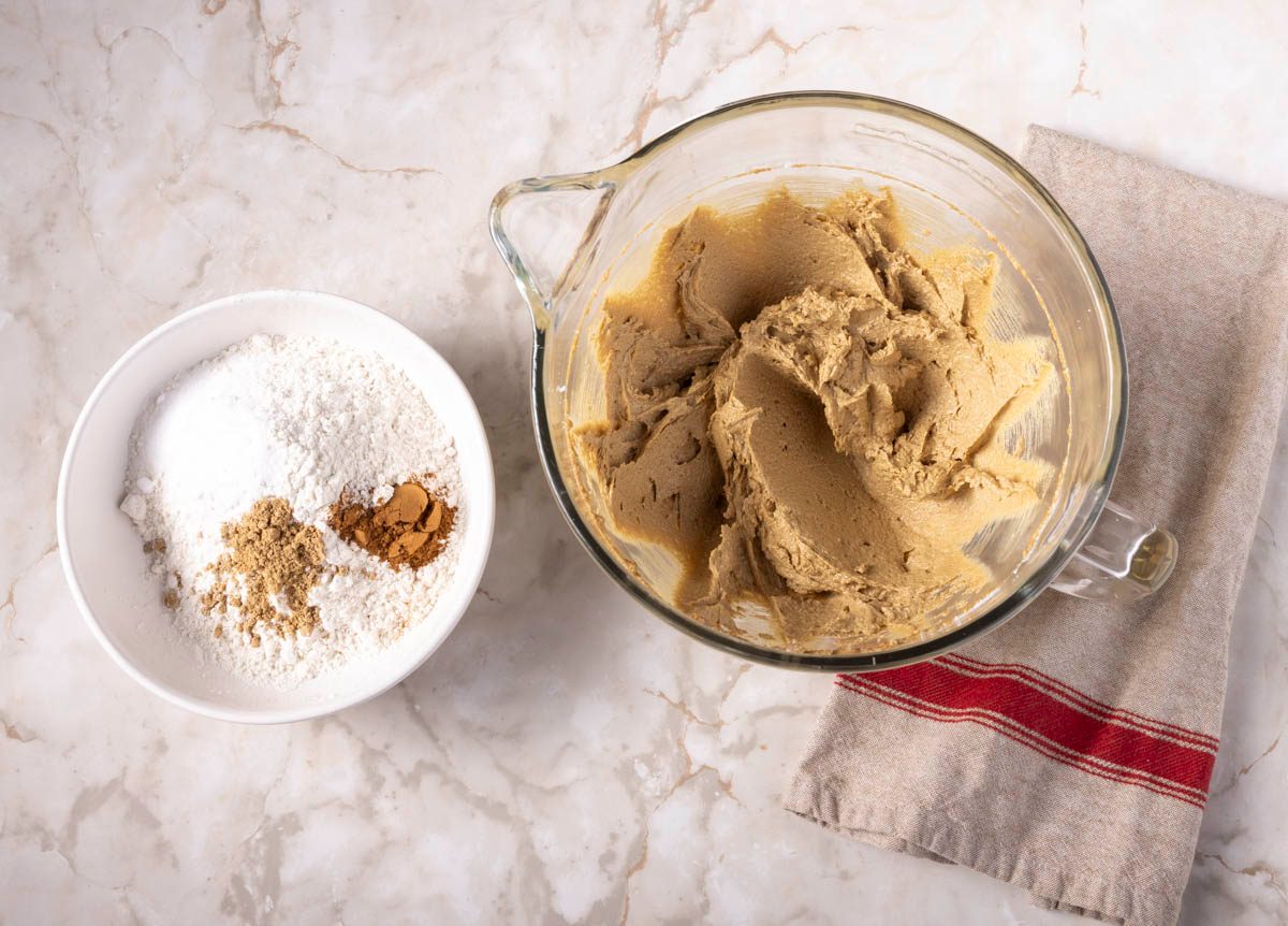 mixing bowls of ingredients for Gingersnap cookies