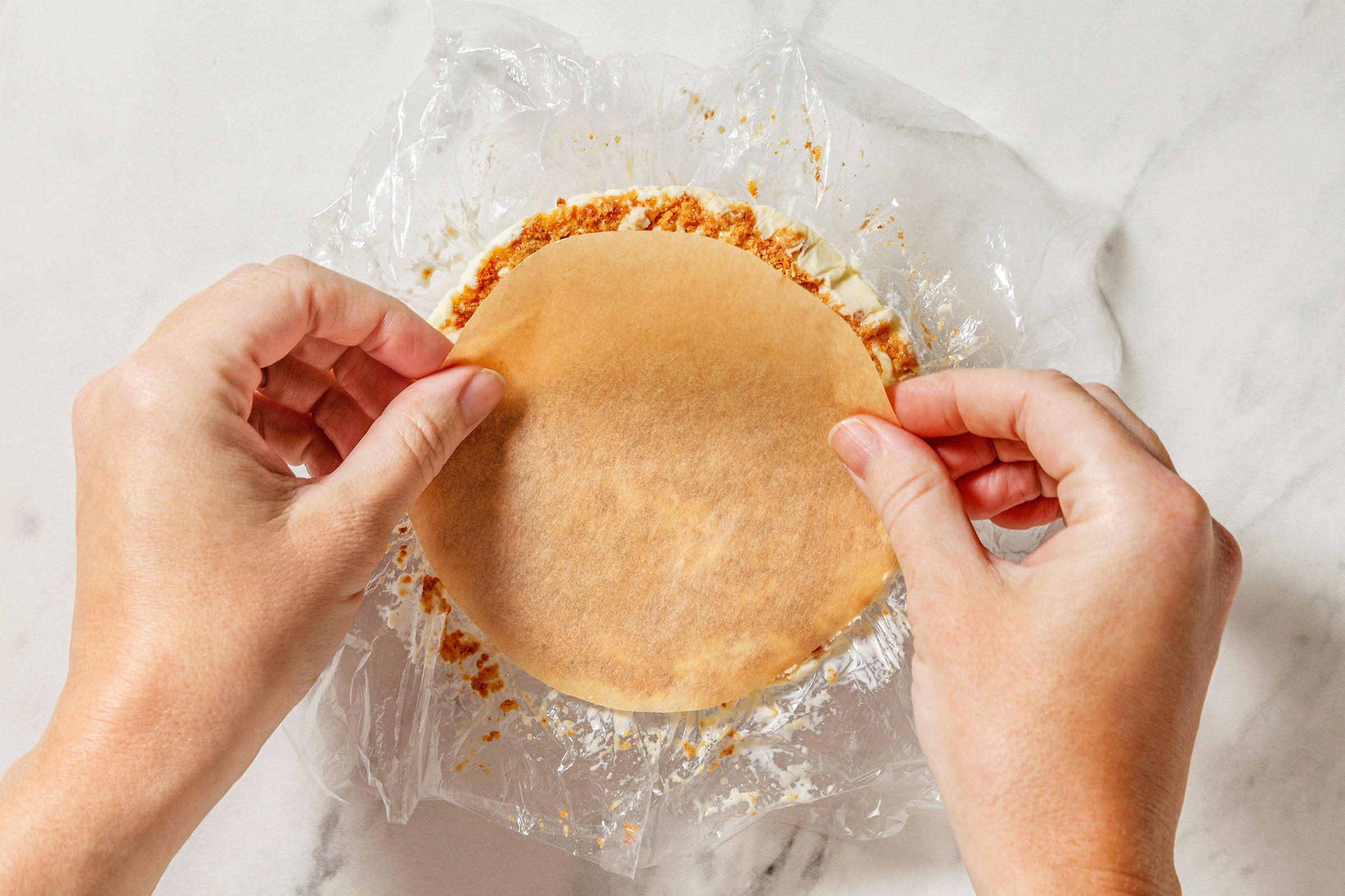 Small parchment placed on top of chocolate ice cream