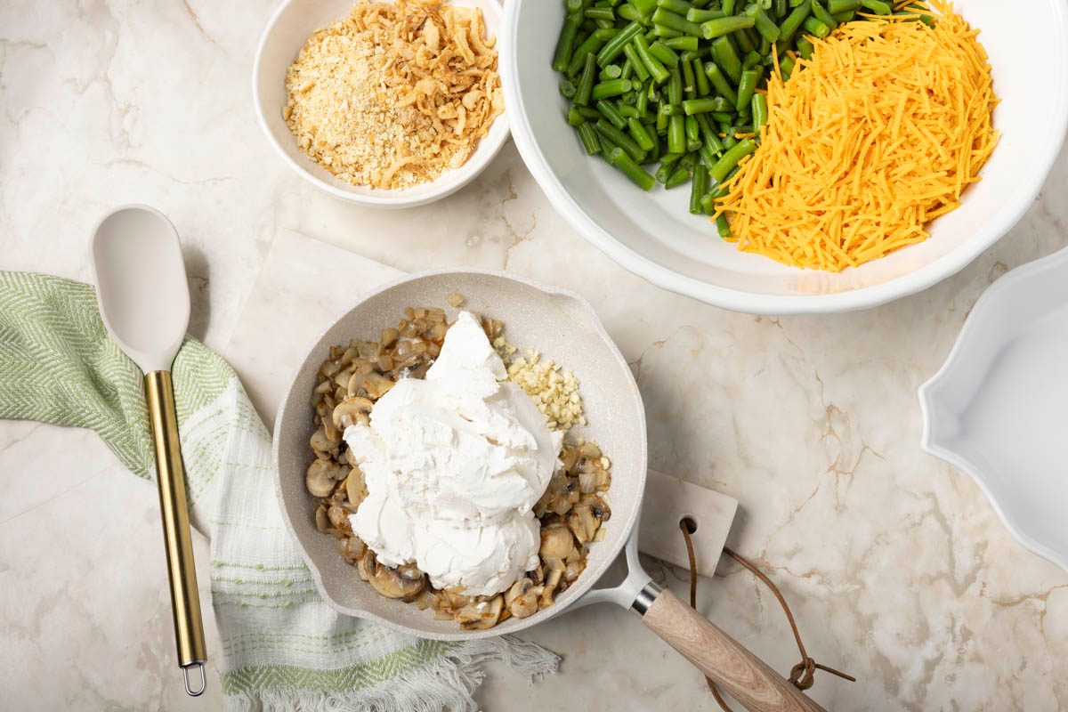 Stir in the sour cream and browning sauce for Vegan Green Bean Casserole