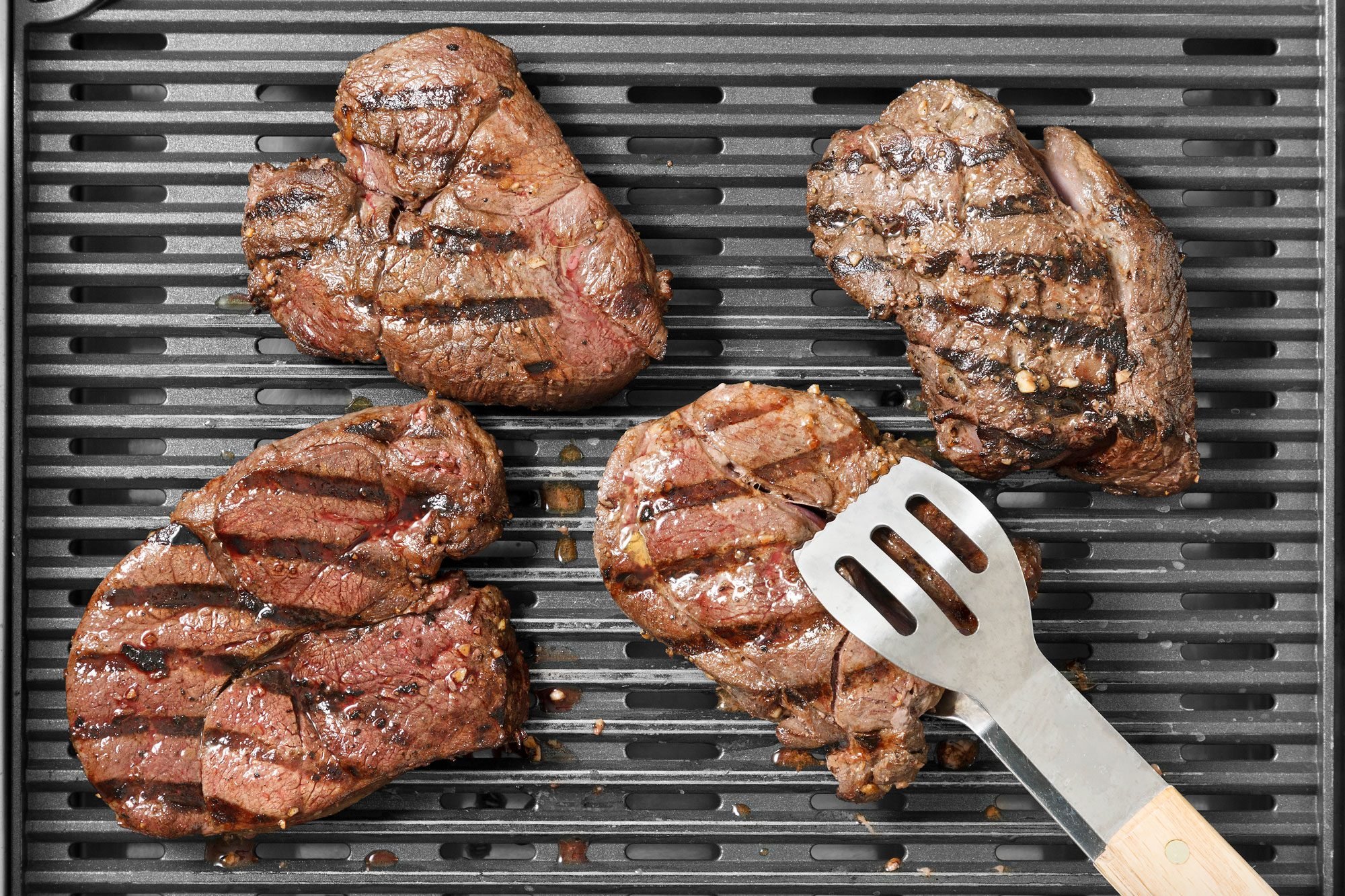 Grill, covered, over medium-high heat until meat reaches desired doneness