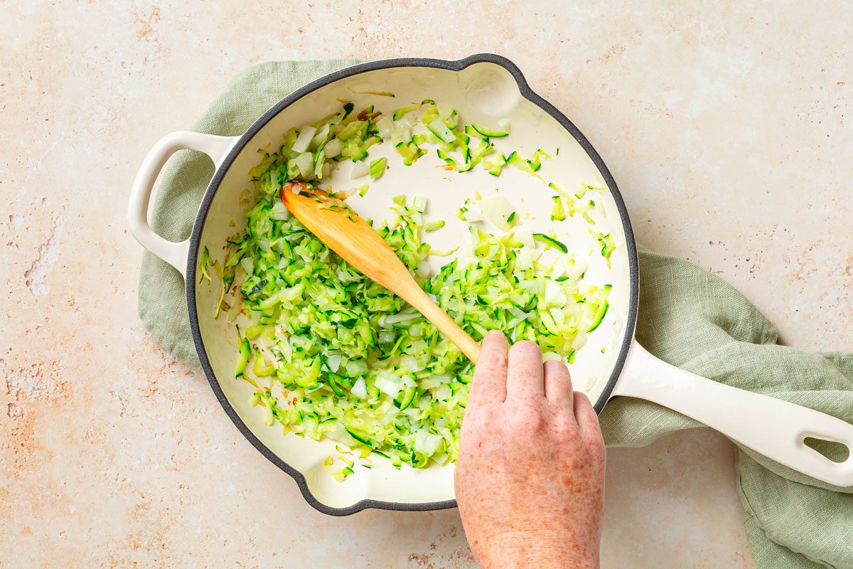 Frying Zucchini And Onion In A Skillet