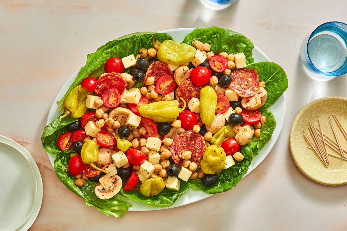 Antipasto mixture served on a lettuce-lined platte