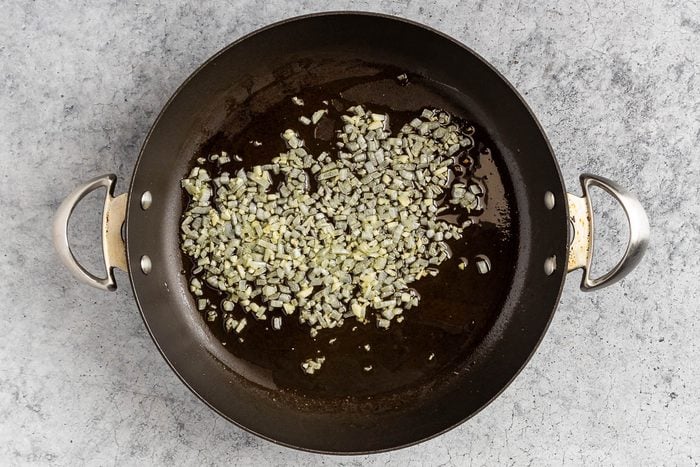 Taste of Home Penne all'Arrabbiata photo of the sautéed onion and garlic.