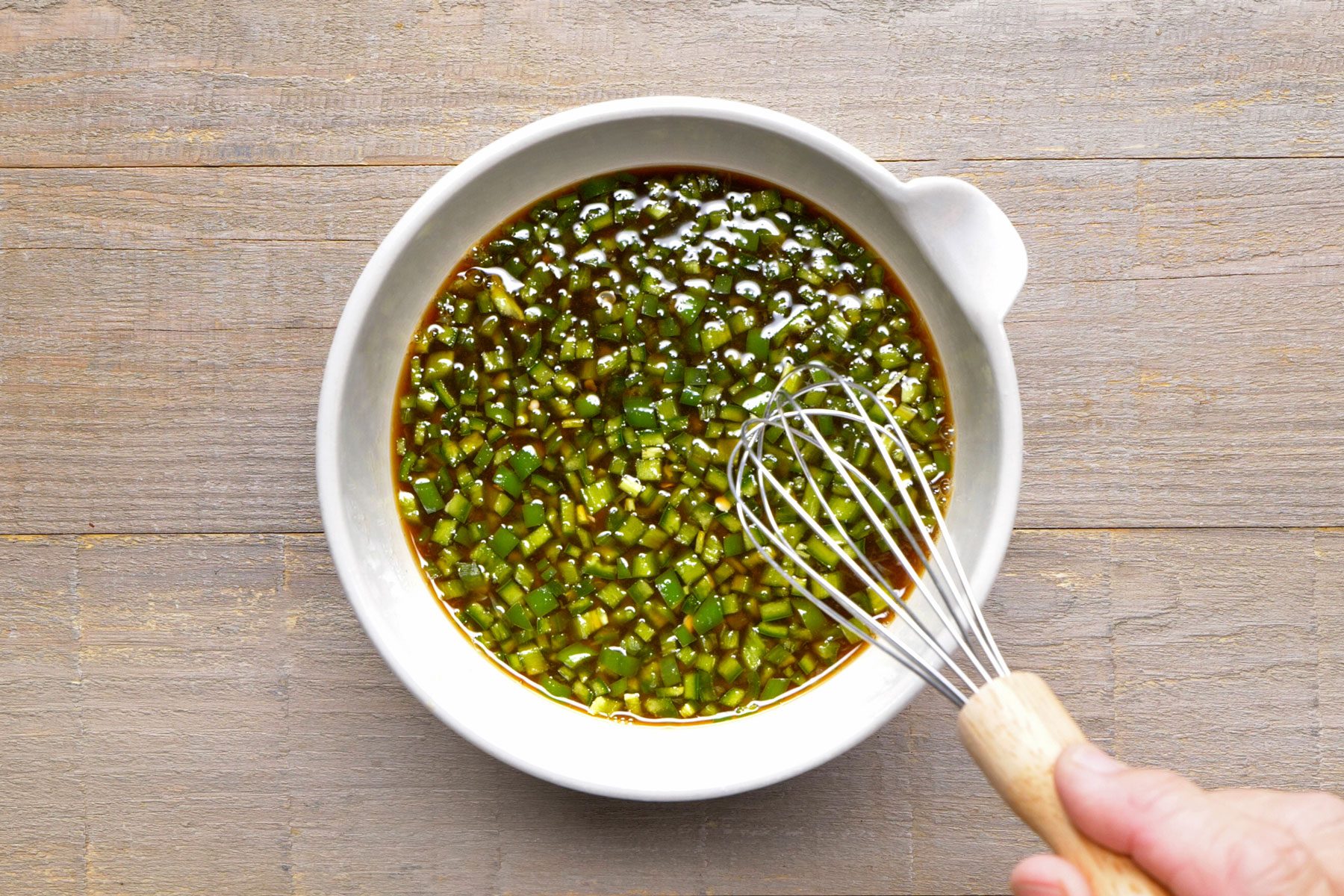 pineapple juice, soy sauce, stock, lime juice and peppers combined together