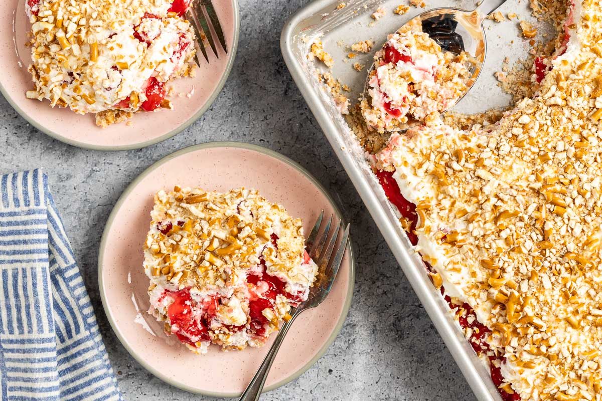 Taste of Home Cherry Pretzel Dessert photo of the finished recipe served on plates.