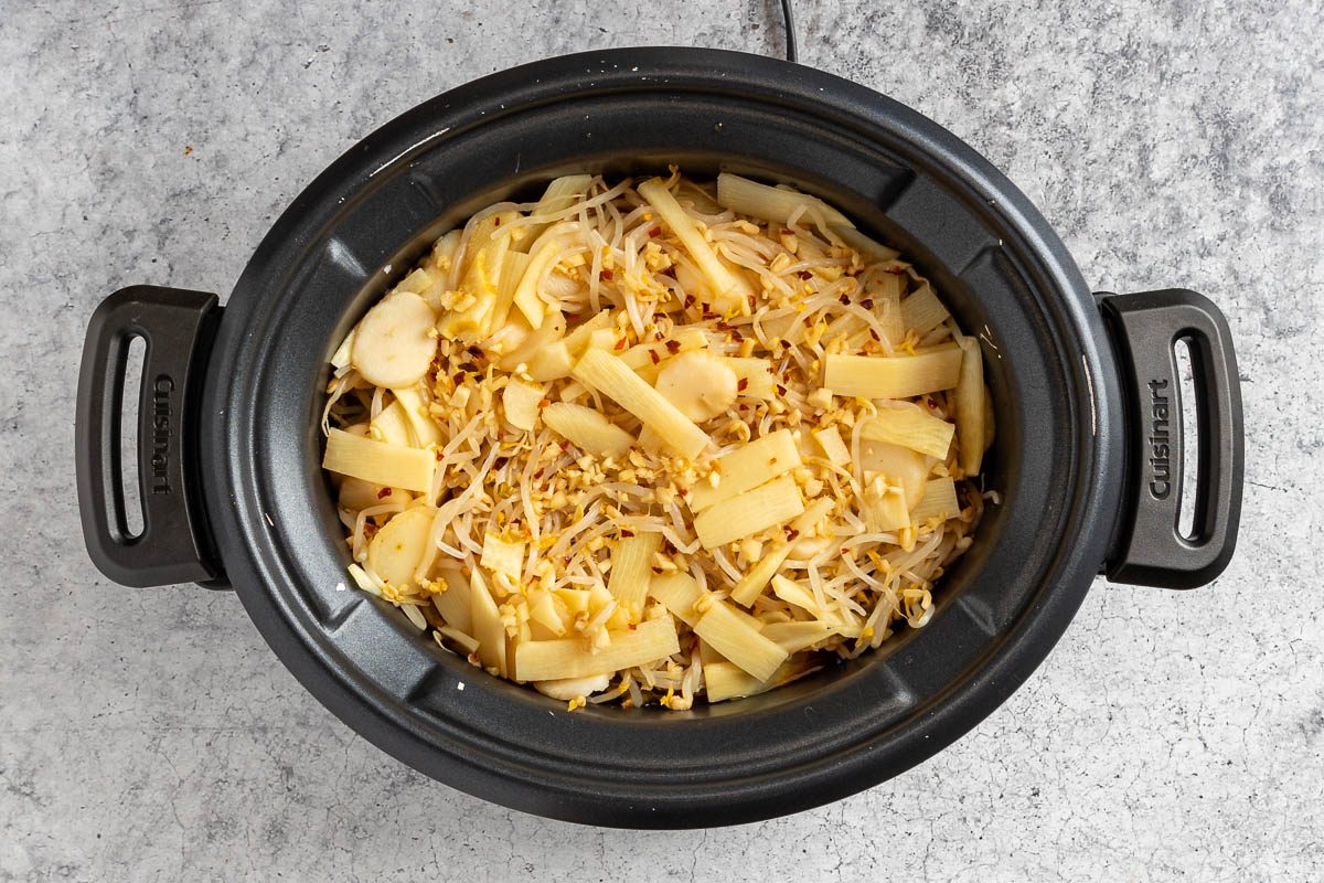 Taste of Home Chicken Chop Suey photo of the chicken and vegetables in a slow cooker.