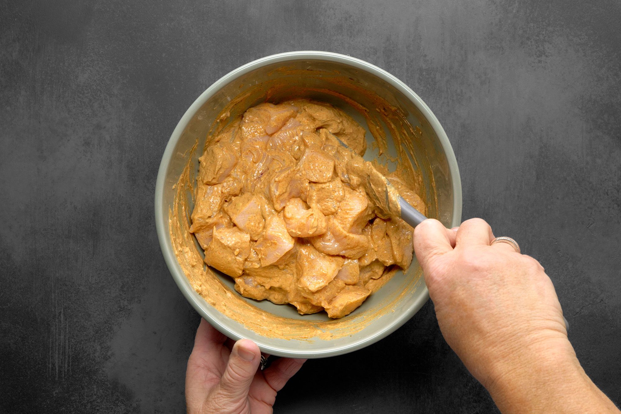 Marinate and coat the chicken evenly