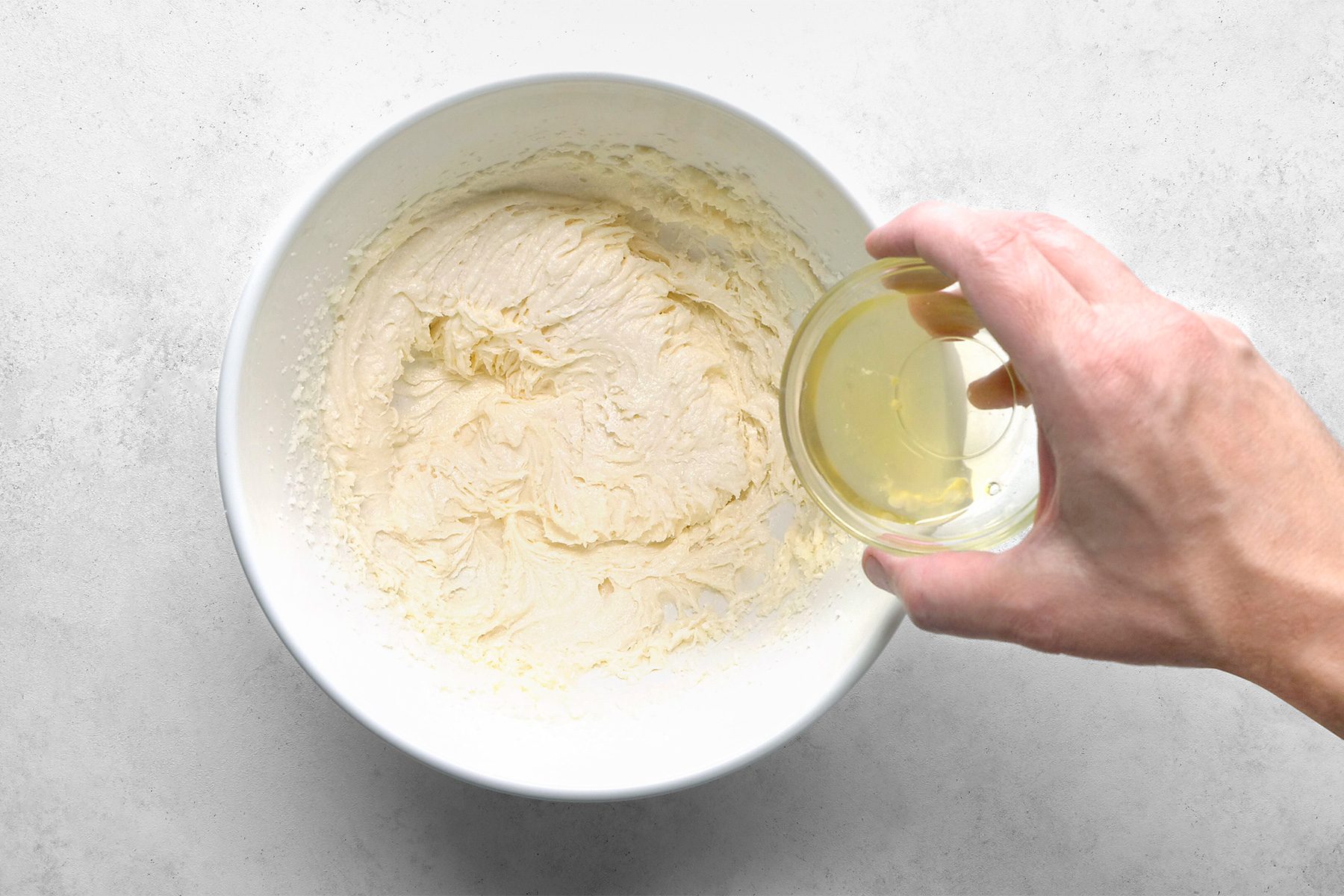 Beat in vanilla extract and egg whites,