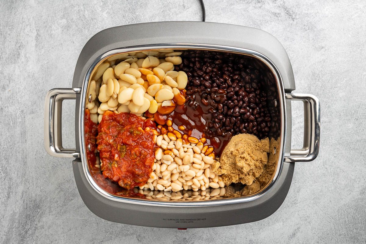 Taste of Home Crockpot Baked Beans recipe photo of all the ingredients in the crockpot.