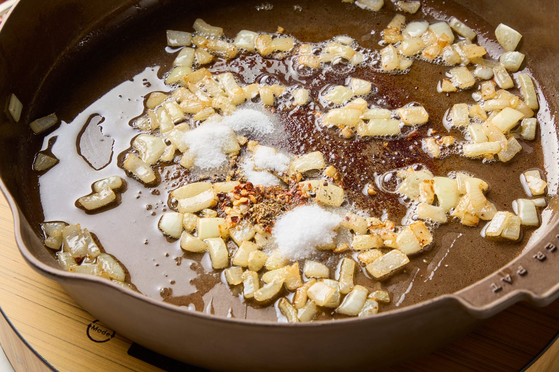 Stir in sugar, salt, red pepper flakes and pepper.