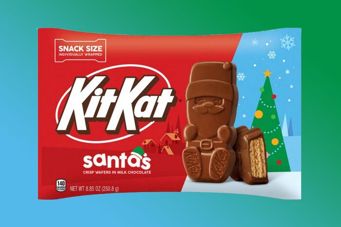 Kit Kat Santas packaging on blue-green gradient background
