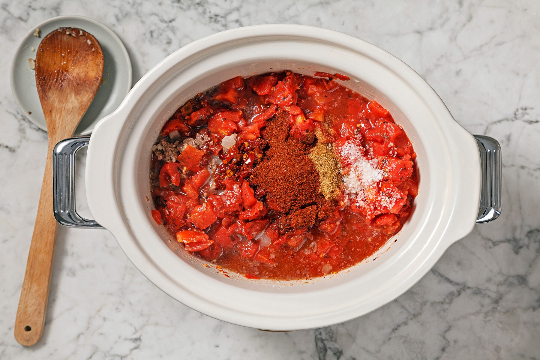 Transfer onion garlic mixture to slow cooker.