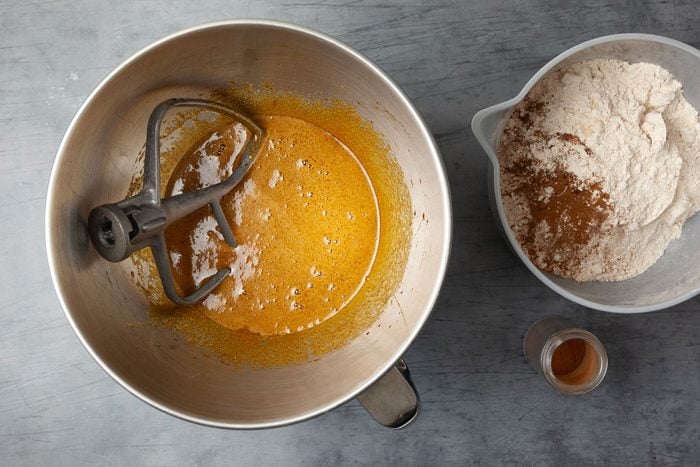 Step 1 of Taste of Home Molasses Crackle Cookies is to mix the wet ingredients