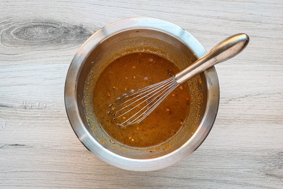 Peanut butter sauce with Asian ingredients for a peanut chicken stir-fry dish.