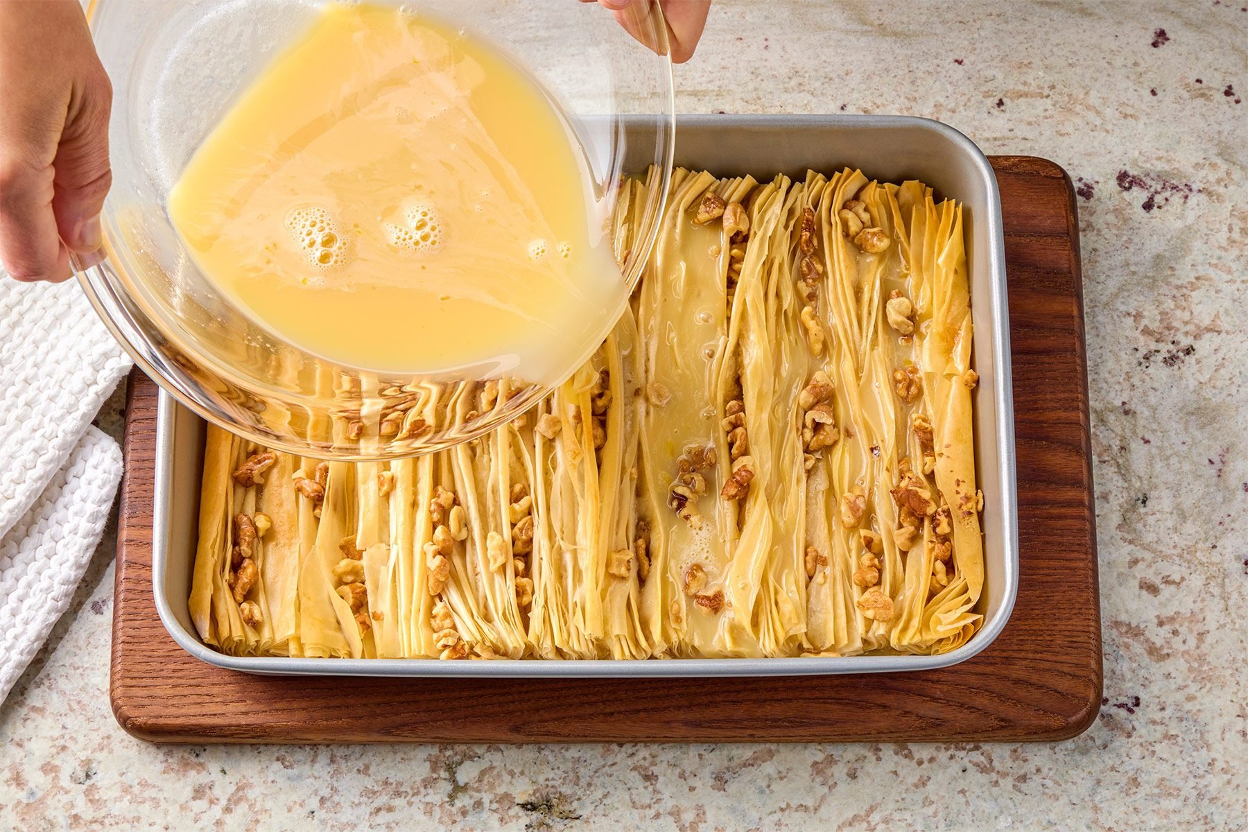 Pour custard mixture over phyllo