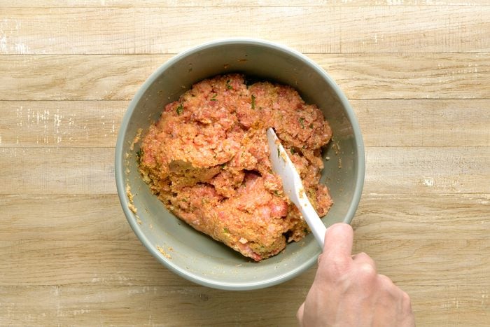 All polpette ingredients combined in a large bowl.