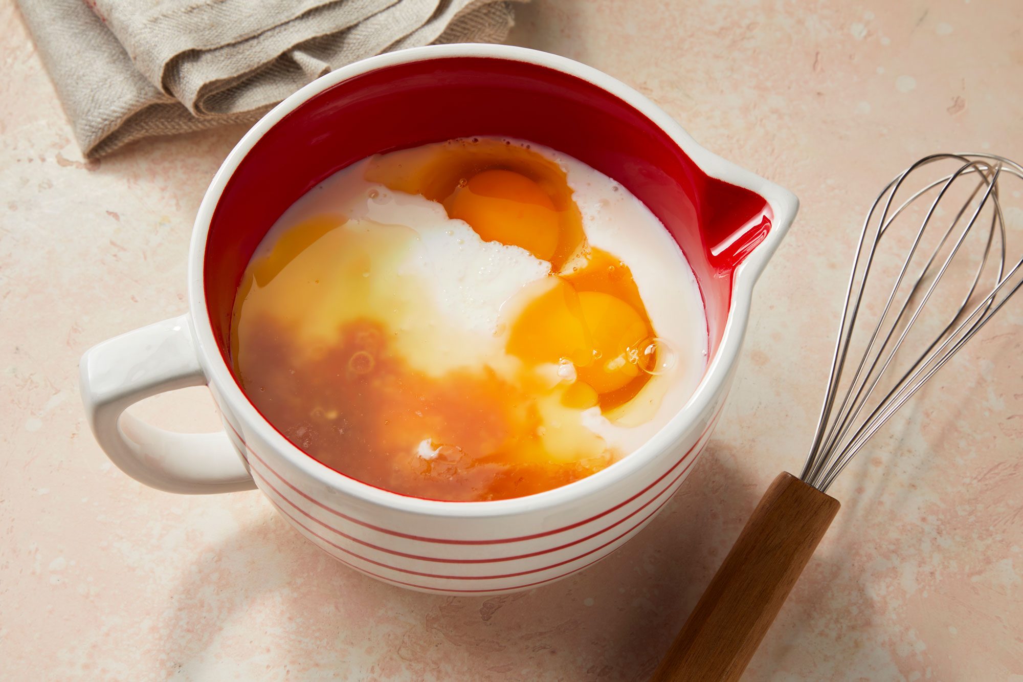 In another bowl, whisk together eggs, buttermilk, melted butter and vanilla extract