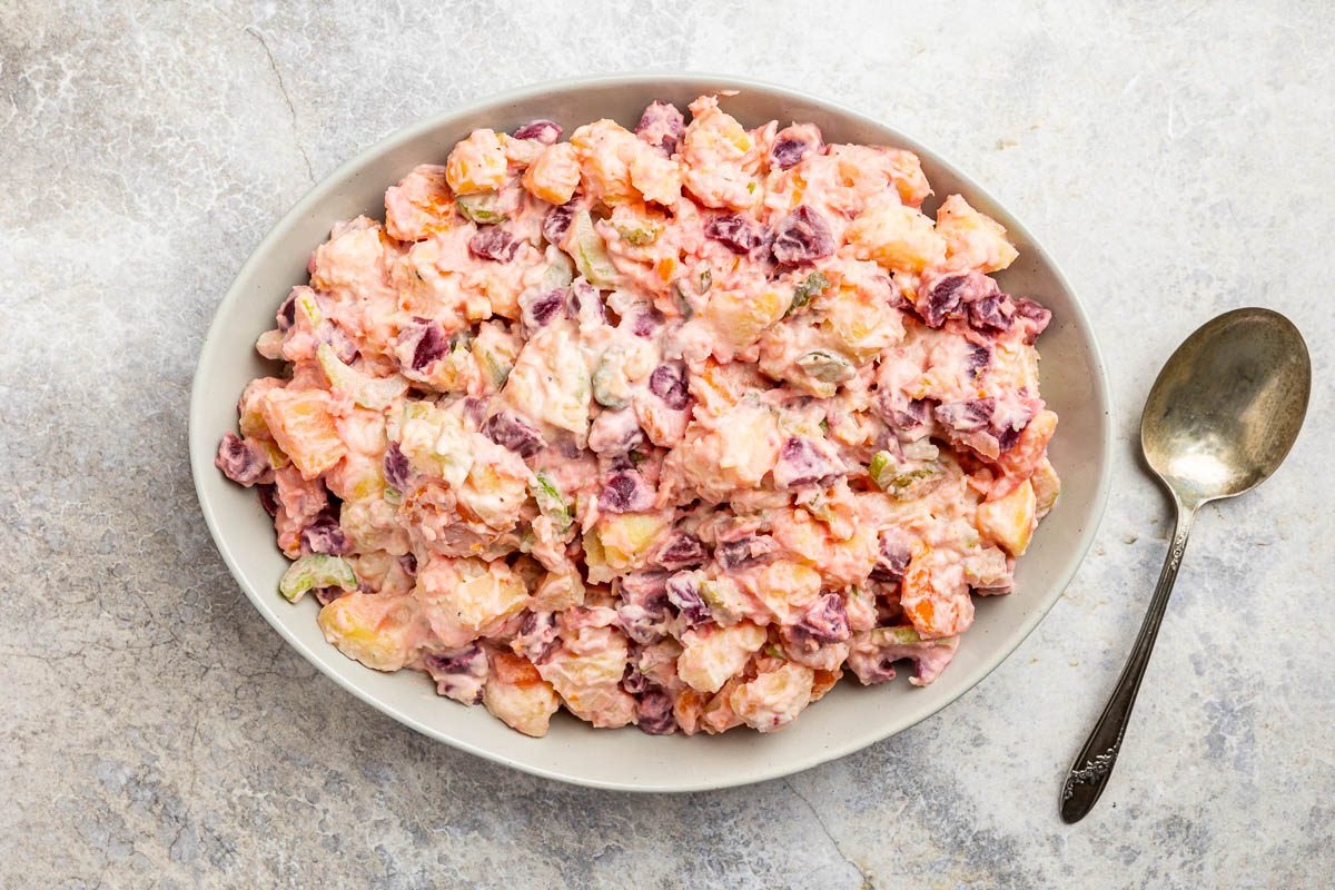 Taste of Home Russian Potato Salad recipe photo of the finished recipe in a serving dish.