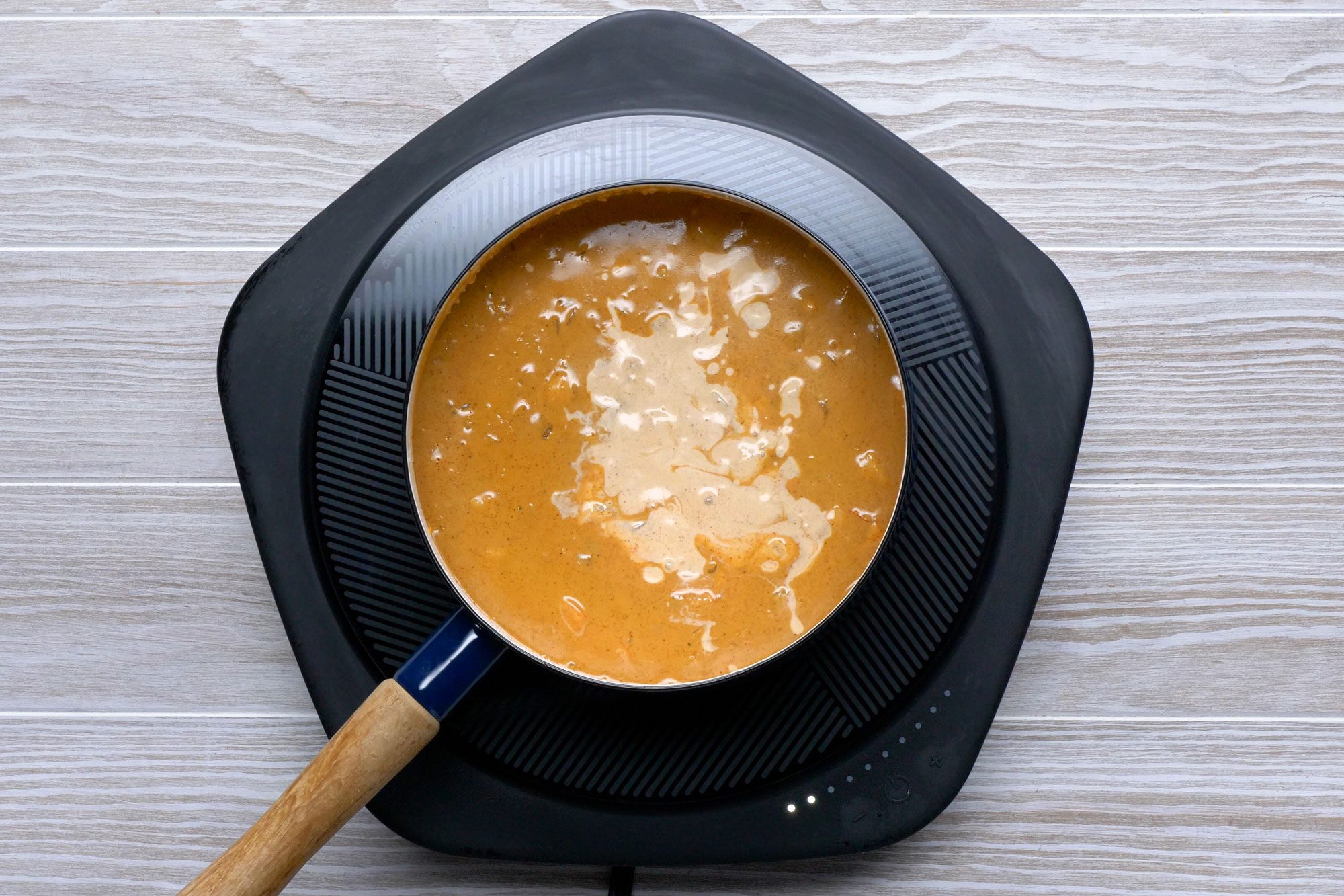 Return all to the pan stirring constantly then garnish with cilantro and avocado