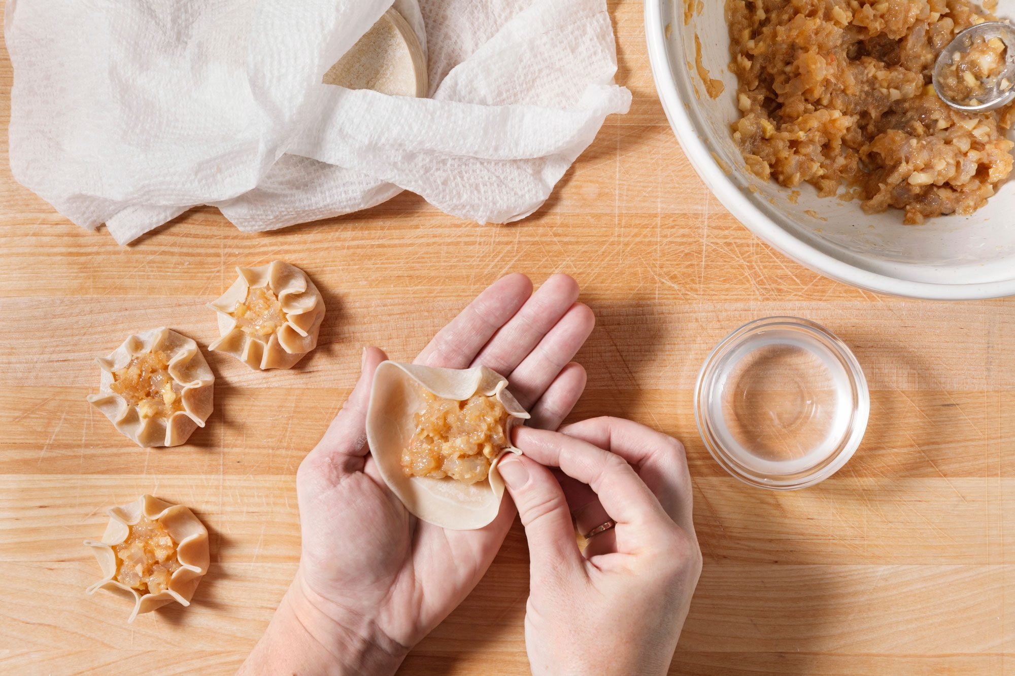 Close your hand slightly to form a cup shape.
