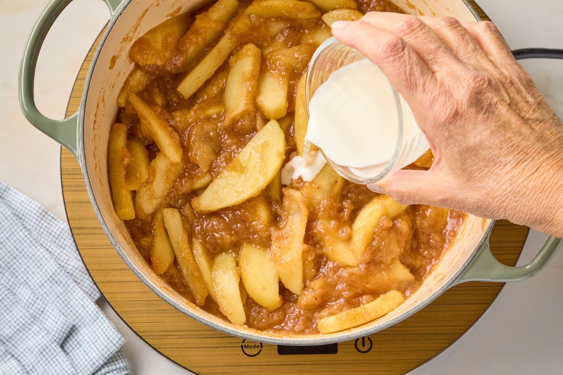 Stir into apple mixture; simmer 1-2 minutes or until thickened. Remove from heat; let slightly cool.